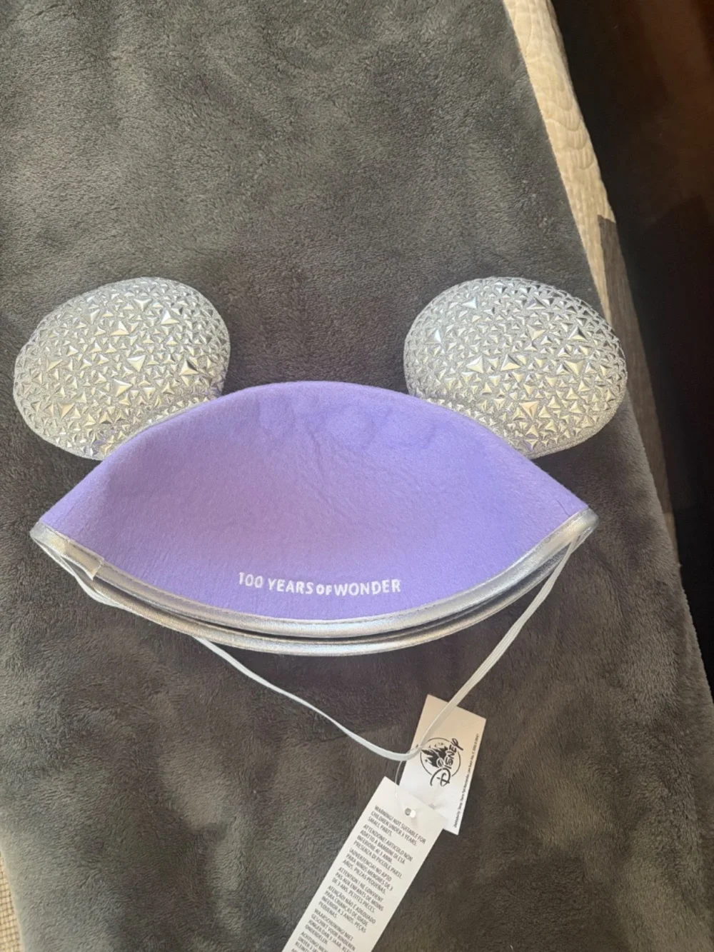 Disney light purple 100years hat with silver padded ears. Adult sized.